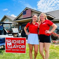 Tom's daughters volunteering at his golf outing